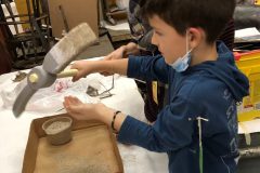 Ari and his dad Charles decorate the mountain climber’s axe --- Photo byDorothy Chapman