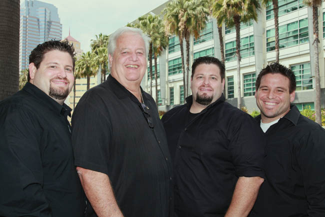 Dean, left, Don, Danny and David Zimmerman on the 20th Century Fox lot. Photo by Deverill Weekes.